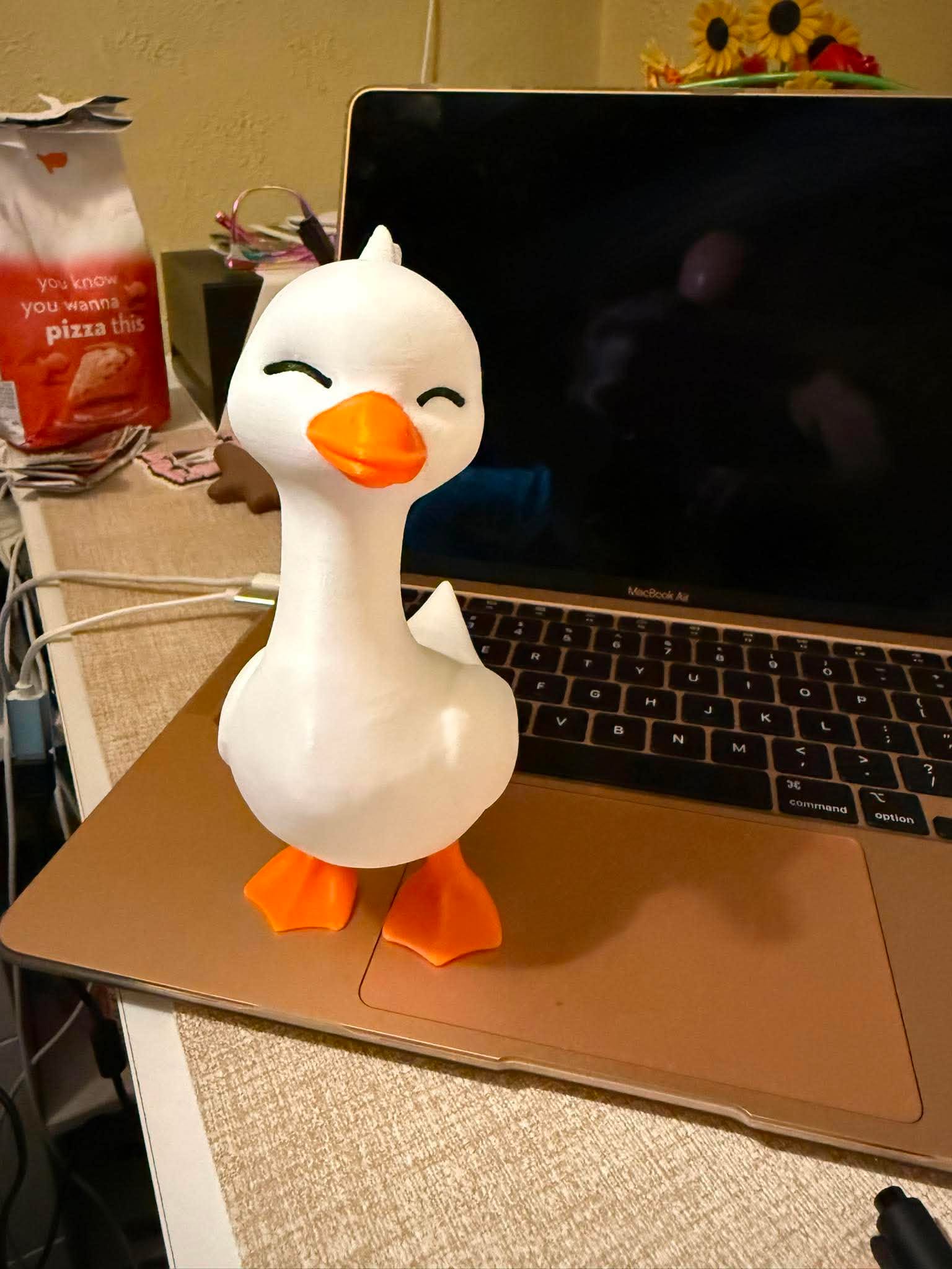 Cheerful white duck figurine